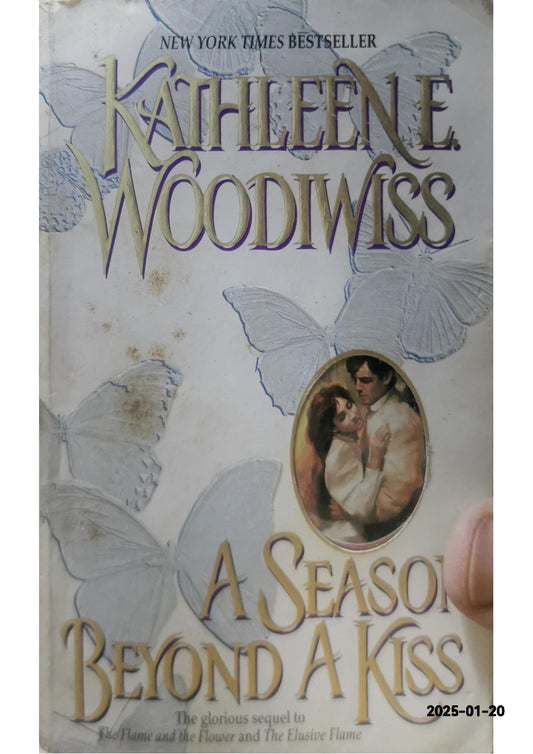 A Season Beyond a Kiss Book by Kathleen E. Woodiwiss