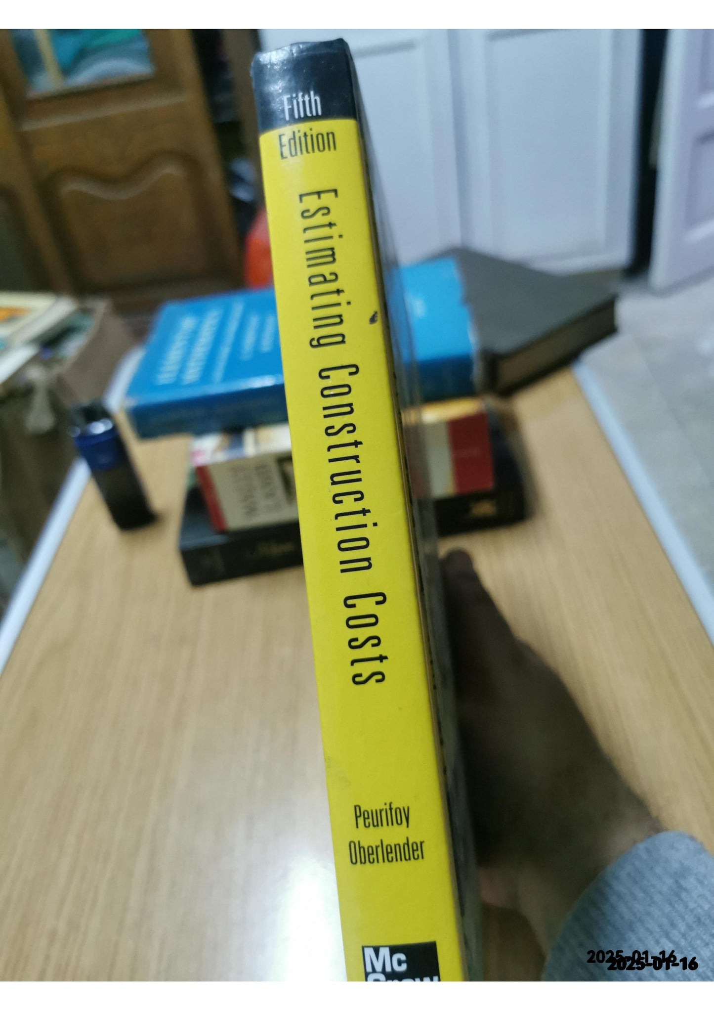 Estimating Construction Costs (McGraw-Hill Series in Construction Engineering and Project M) Hardcover – January 1, 2001 by Robert L. Peurifoy (Author)