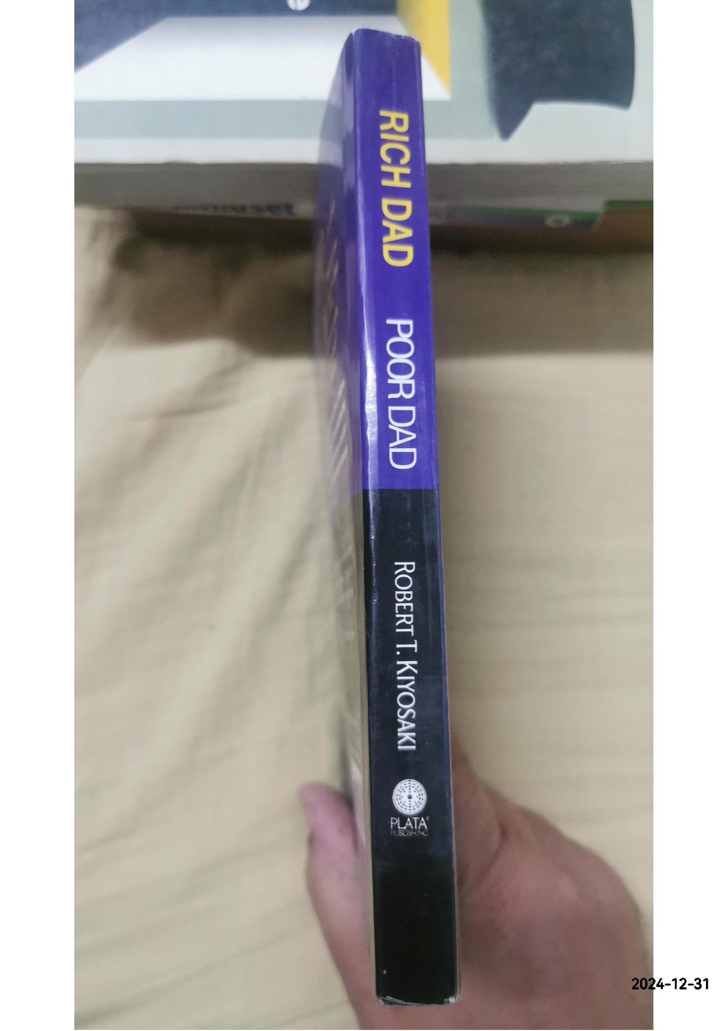 Rich Dad Poor Dad: What The Rich Teach Their Kids About Money That the Poor and Middle Class Do Not! by Kiyosaki, Robert T.