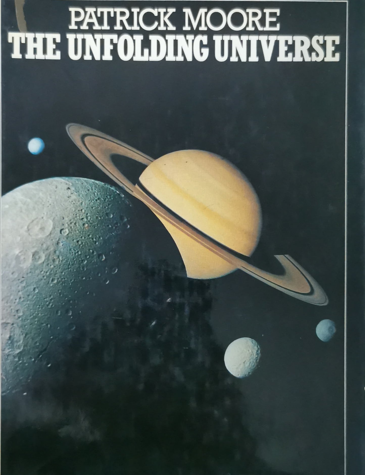 The Unfolding Universe Hardcover – December 12, 1988 by Patrick Moore (Author)