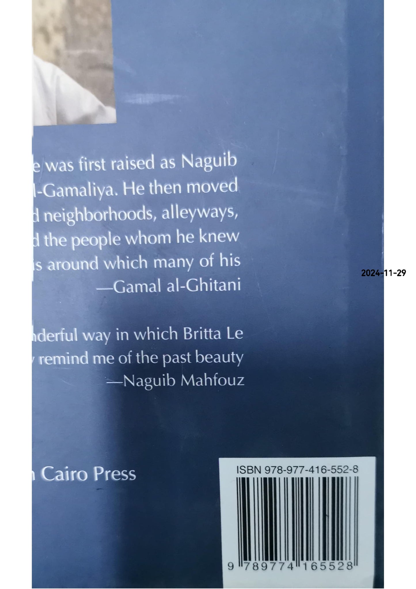 The Cairo of Naguib Mahfouz Hardcover – September 15, 2012 by Britta Le Va (Photographer), Naguib Mahfouz