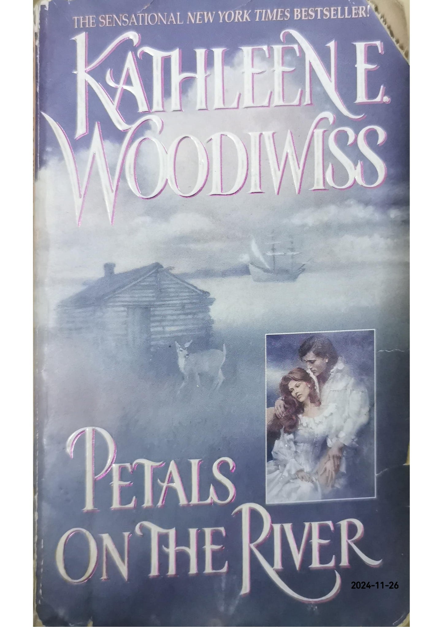 Petals on the river Book by Kathleen E. Woodiwiss