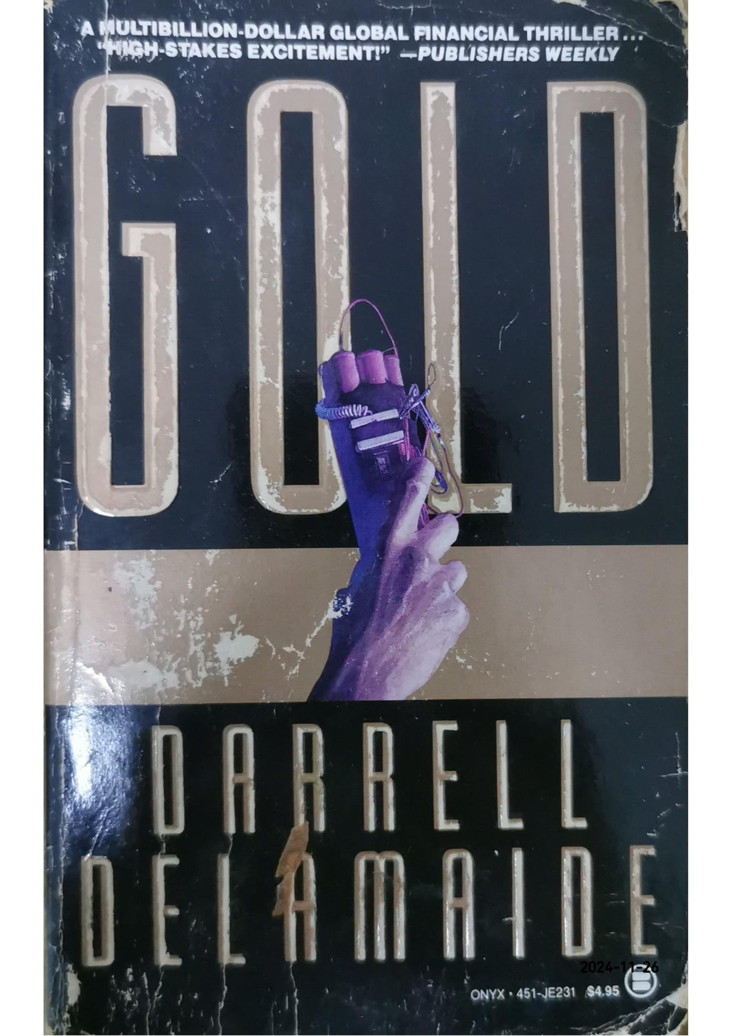 Gold Paperback – = by Darrell Delamaide